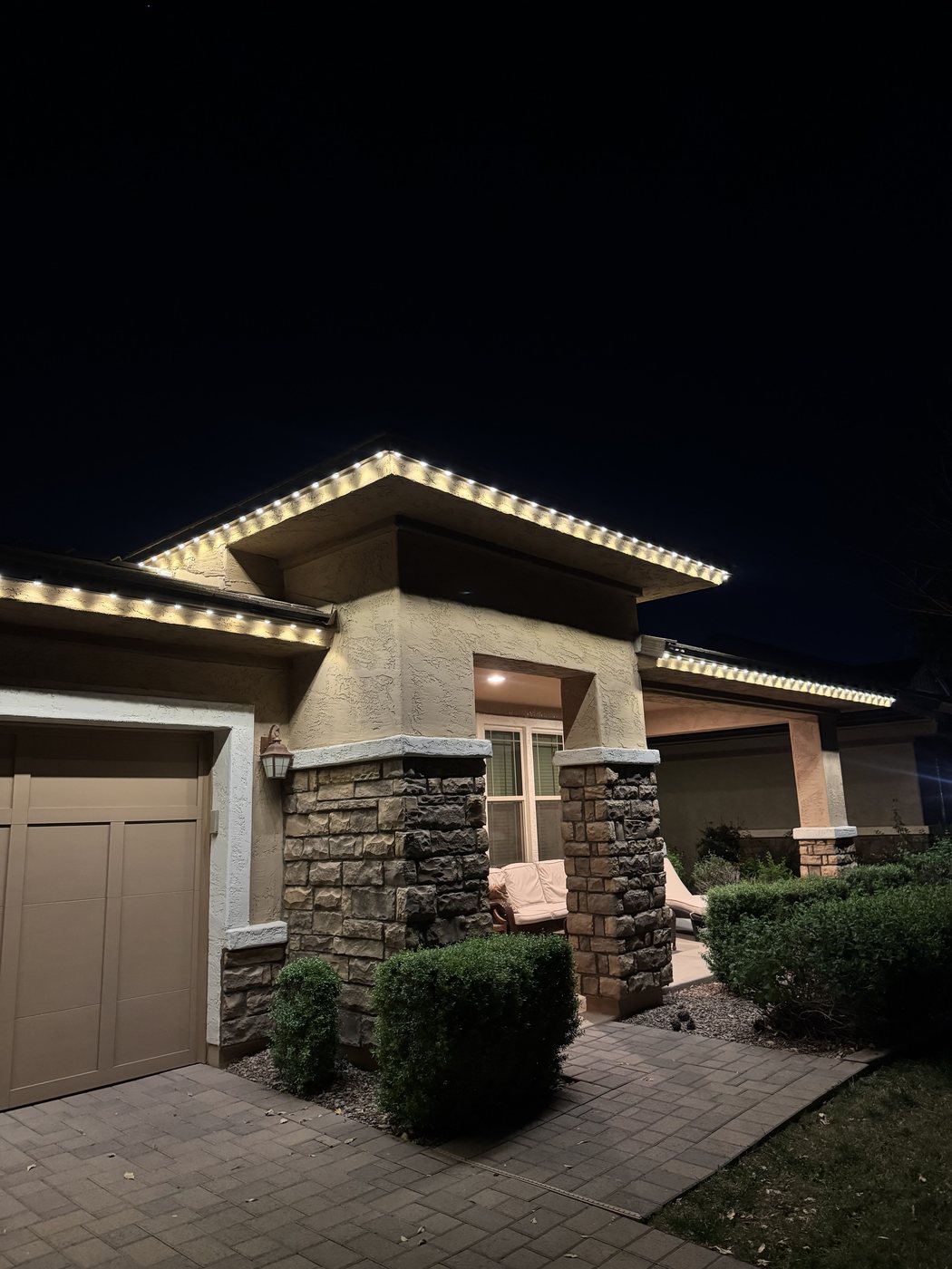 Backyard patio with permanent ambient lighting